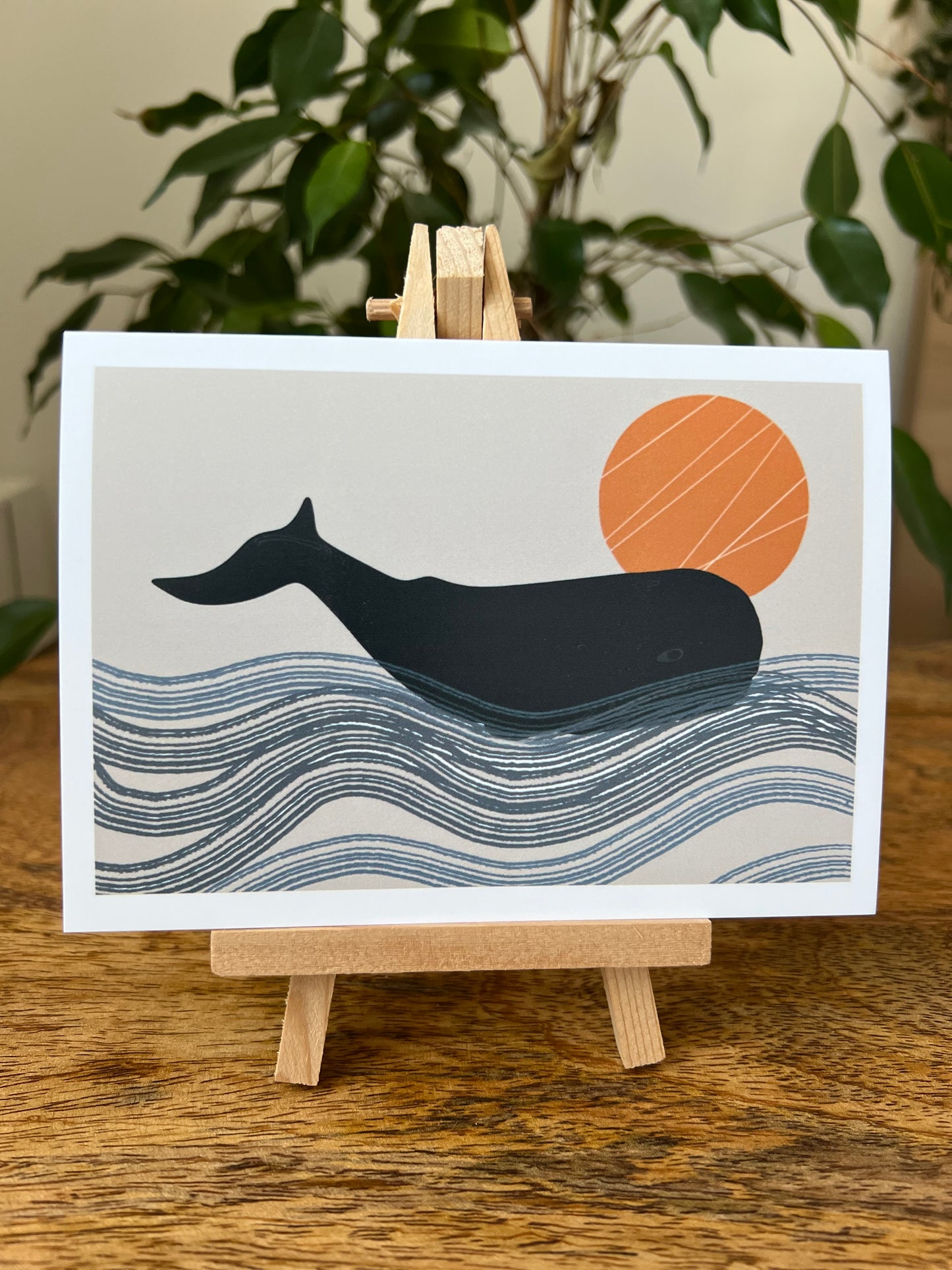 Whale in ocean with Orange Sun greeting card blank neutral