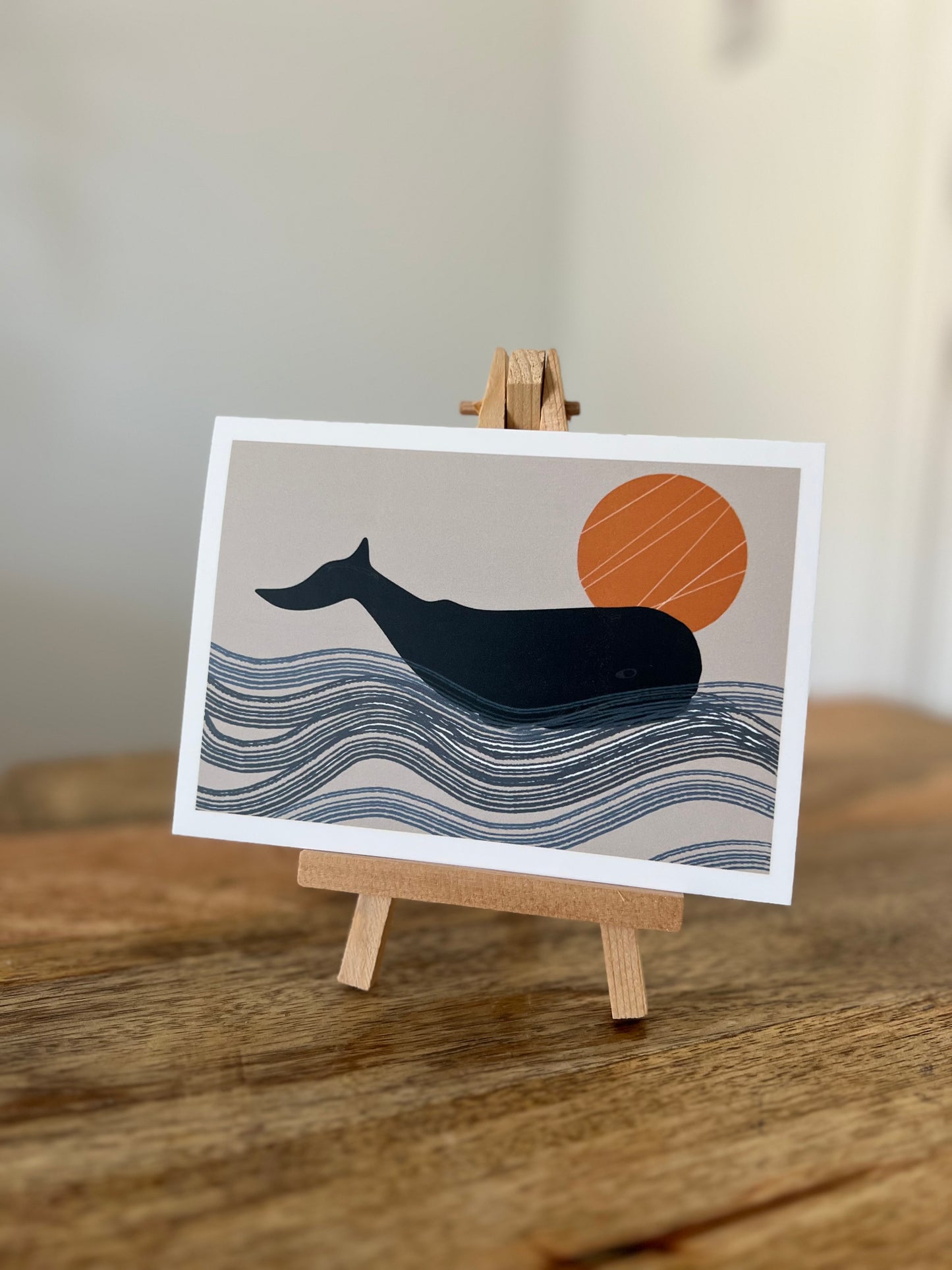 Whale in ocean with Orange Sun greeting card blank neutral