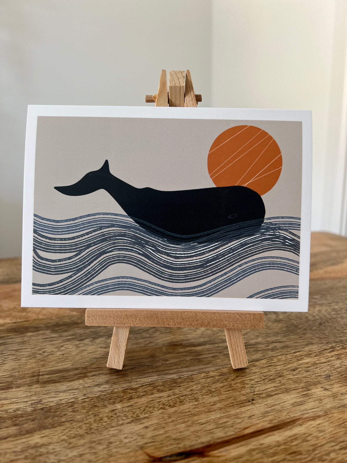 Whale in ocean with Orange Sun greeting card blank neutral