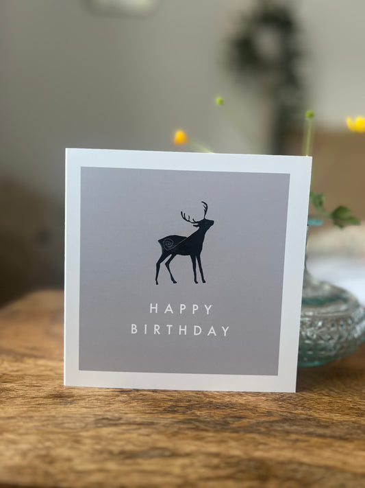 Deer with spiral and grey background