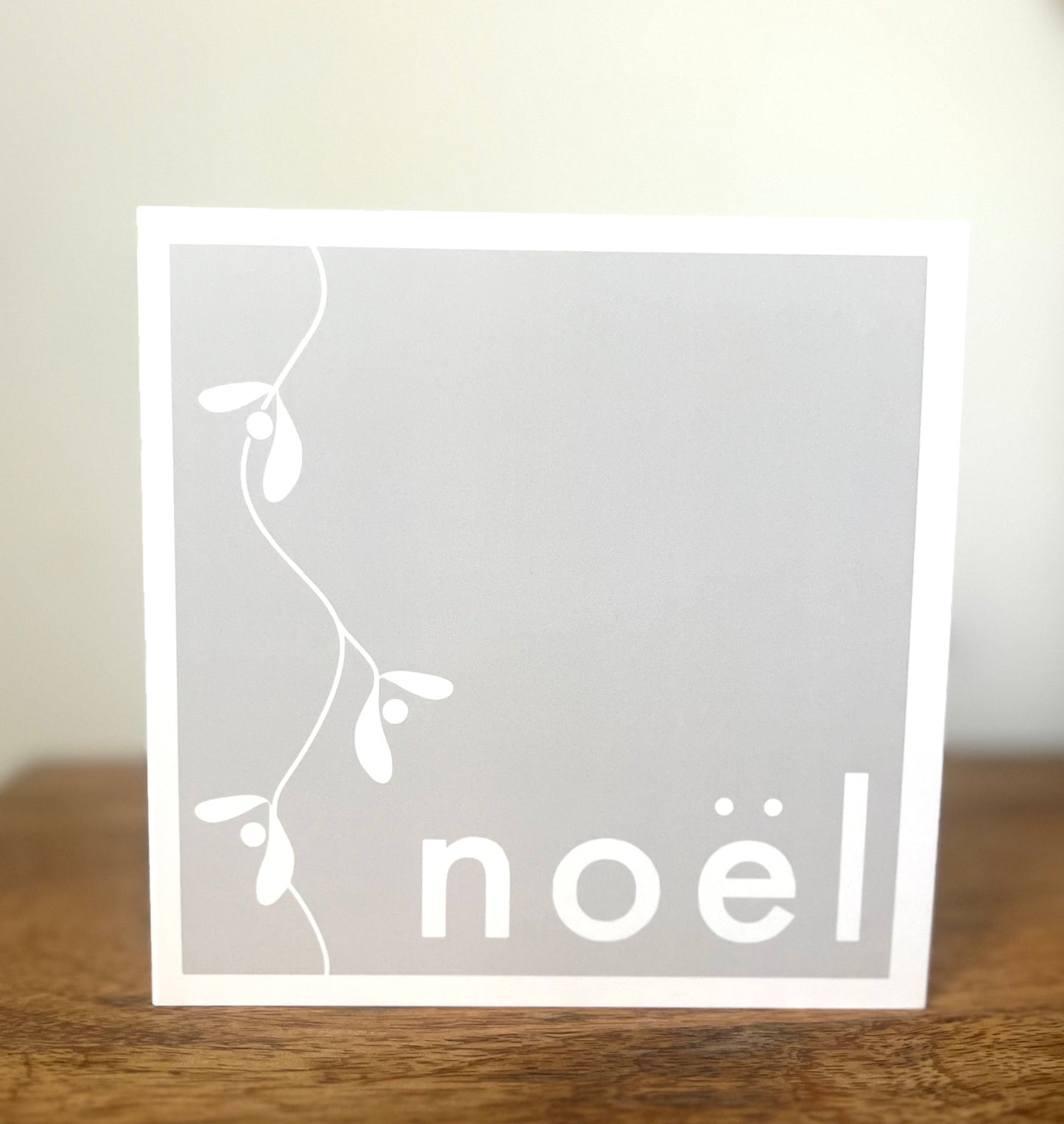 A Minimalist Neutral Noël and Mistletoe greeting card